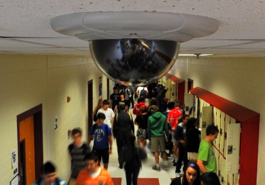 Security camera recording daily actions within the school