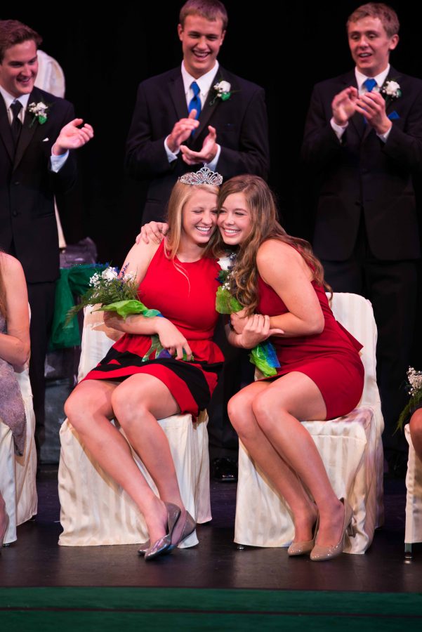 Carly Czeplewski (left) celebrating her coronation as homecoming queen with Allie Randall (right)