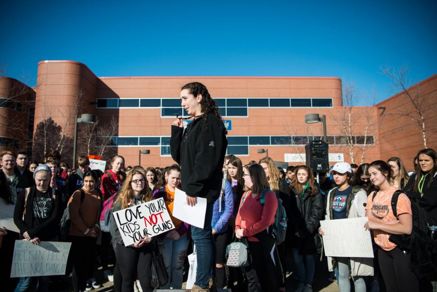 Student protest organizer Miriam Lebowitz speaks to hundreds of students at the walkout.