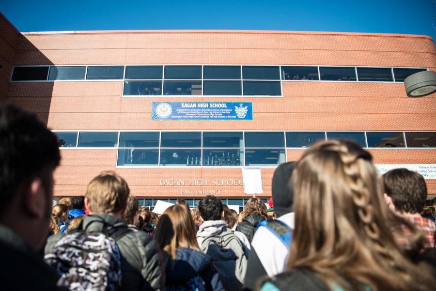 Eagan students stand outside the east entrance to protest gun violence. 